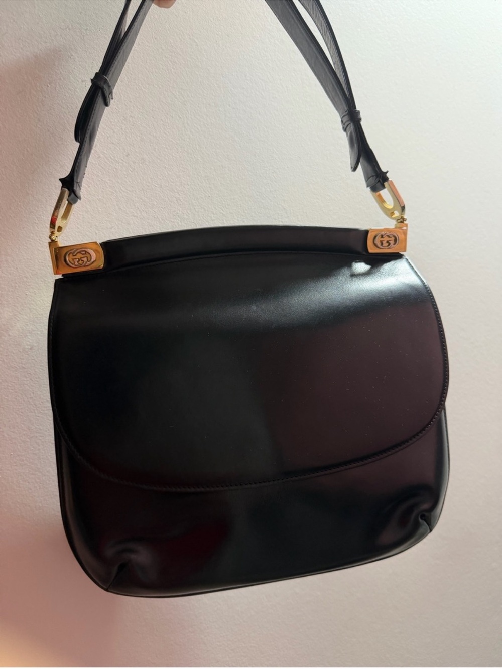 4 black Gucci bags